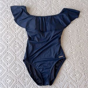 Excellent condition, never worn, Michael Kors one piece swim suit, size 6